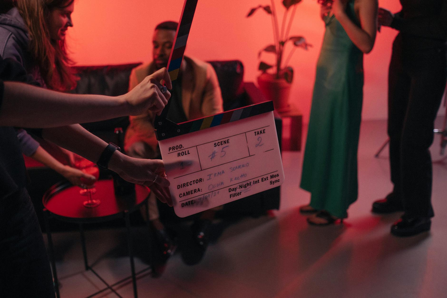 Behind the scenes of a film production with clapperboard